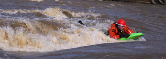 Photo: Spencer Cooke, Effort Inc - Adam Bellyak Surfs on the French Broad River