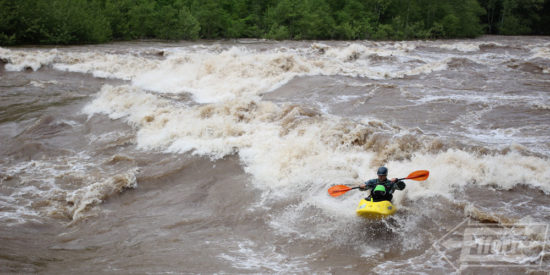 Eric loads up and bounces on a powerful piece of water.